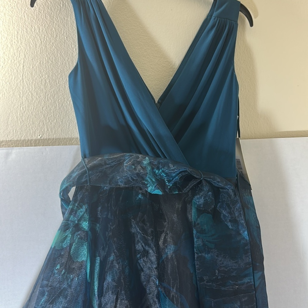 Mixed Media Sleeveless A-Line Gown
Eliza J - Picture 5 of 11